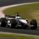 David Coulthard running Suzuka in 2003. I believe this is 130R. Look close and you’ll see the dust on this slide film.